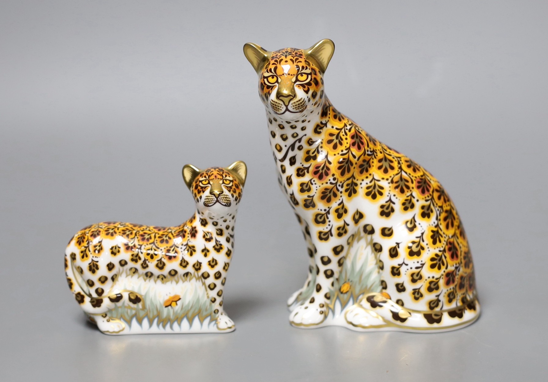 Two Royal Crown Derby paperweights - Leopardess, gold stopper, boxed with certificate and Leopard Cub, gold stopper, boxed with certificate
